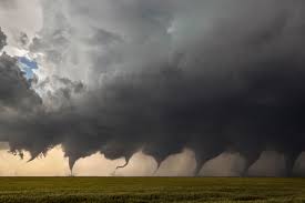 Severe supercell thunderstorm with developing tornado over open plains
